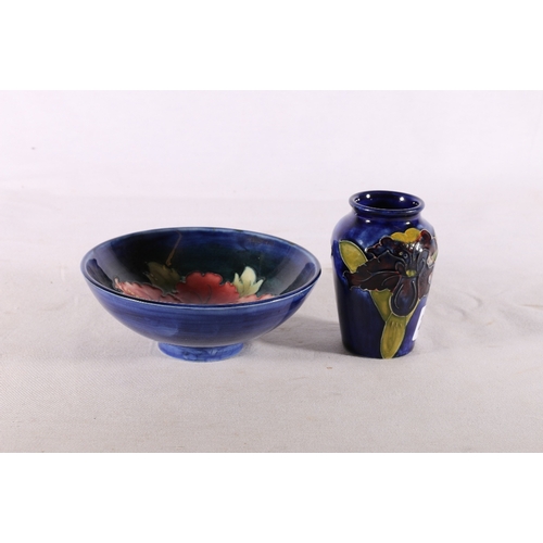 245 - Moorcroft hibiscus pattern bowl 14cm diameter and an orchid pattern vase, 9.5cm tall, (2) 