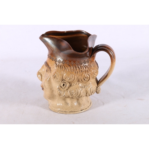 261 - 19th century brown salt glazed stoneware character jug, possibly Charles Bloodworth of Lambeth, 15.5... 