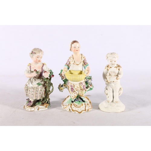 273 - Meissen figure of a girl with roses, blue crossed marks to reverse, 11cm tall, an early Derby figure... 