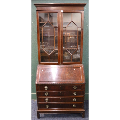 529 - Late 19th century mahogany bureau bookcase with moulded cornice above two astragal glazed doors abov... 