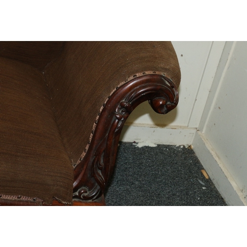 537 - 19th century mahogany scroll arm settee, the recurved back above carved scroll arms with floral moti... 