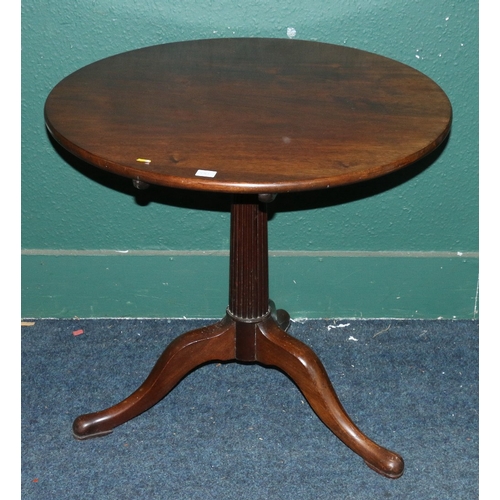 541 - 19th century mahogany circular tilt top table raised on reeded column with three snake legs and pad ... 