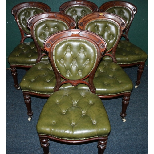 550 - Set of six Victorian mahogany balloon back side chairs with carved scroll top rail, button back back... 