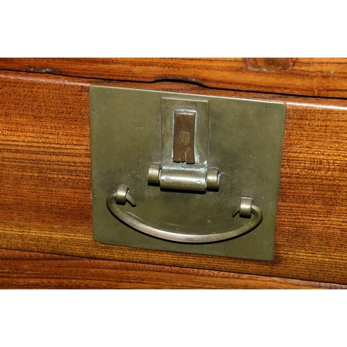 553 - Early 20th century Oriental hardwood desk, the rectangular crossbanded top above an arrangement of f... 