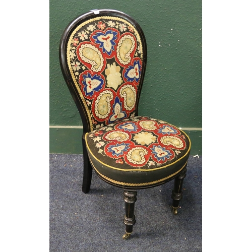 561 - Victorian ebonised spoon back bedroom chair upholstered in floral boteh tapestry and raised on turne... 