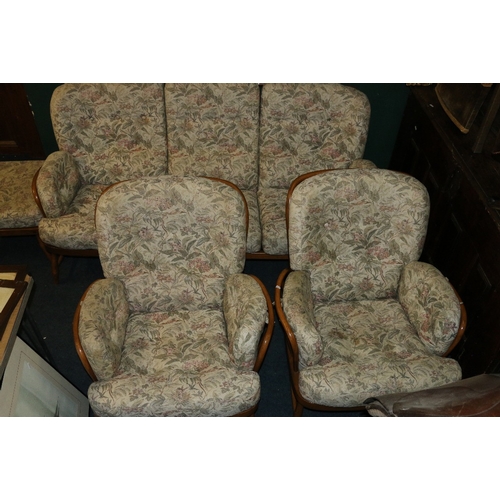 567 - Ercol four piece lounge suite comprising of settee, a pair of armchairs and a footstool 