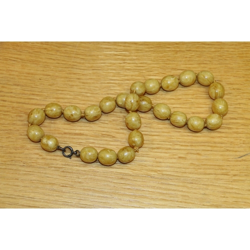 88A - Strand of amber style beads