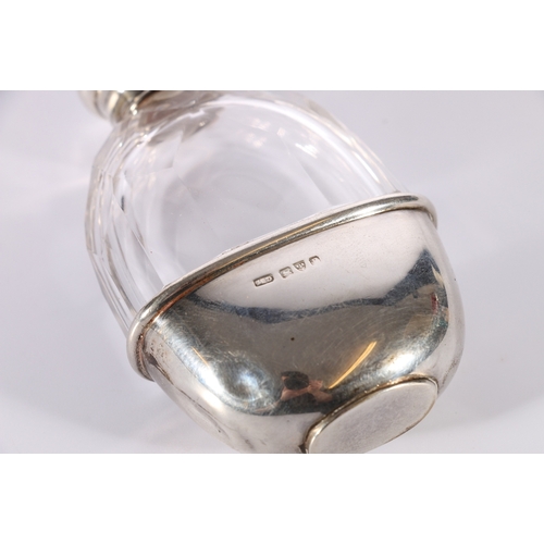 39 - Victorian faceted glass hip or pocket flask of small proportions with silver cup engraved with crown... 