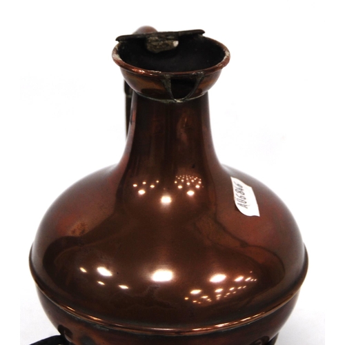 246 - 19th century Aesthetic copper jug on stand with scrolling legs over burner, 21cm high.