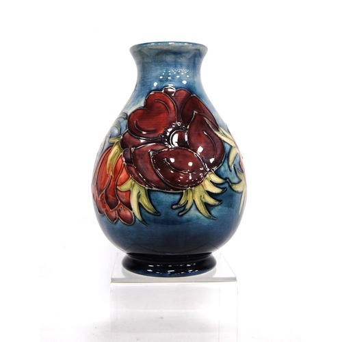 267 - Moorcroft 'Anemone' baluster vase by Walter Moorcroft with line decorated over faded blue ground, si... 