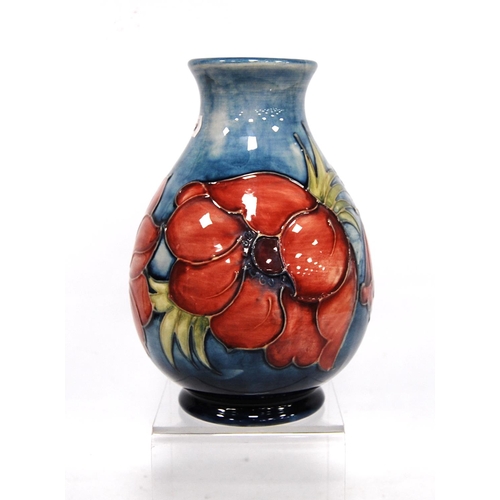 267 - Moorcroft 'Anemone' baluster vase by Walter Moorcroft with line decorated over faded blue ground, si... 