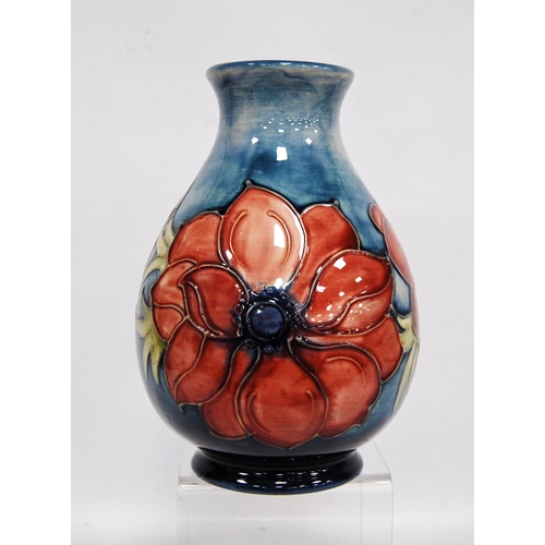 267 - Moorcroft 'Anemone' baluster vase by Walter Moorcroft with line decorated over faded blue ground, si... 