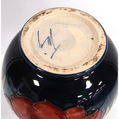 267 - Moorcroft 'Anemone' baluster vase by Walter Moorcroft with line decorated over faded blue ground, si... 