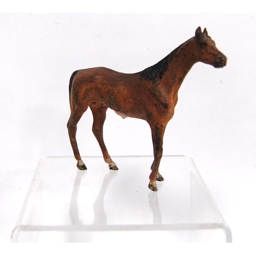 279 - Cold painted bronze model of a horse, unsigned, 8.5cm high.