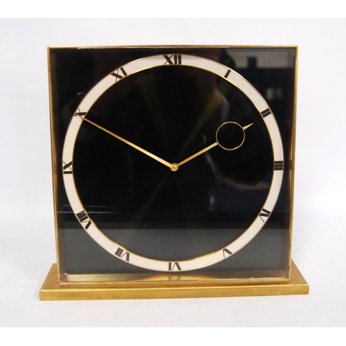 288 - German Art Deco brass desk clock with black face, white chapter ring and eight day clockwork movemen... 