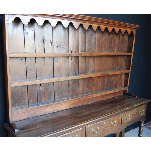 304 - 19th century oak dresser with projected moulded cornice over arched apron, open shelves, moulded rec... 