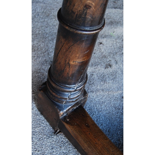 305 - 18th century style refectory table with rectangular plank top enclosing leaves, raised on block and ... 