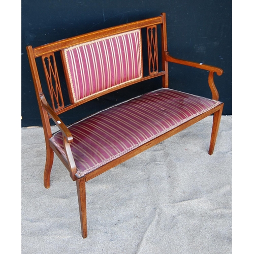 308 - Edwardian mahogany parlour seat, the crossbanded top rail over cushioned back flanked by open fretwo... 