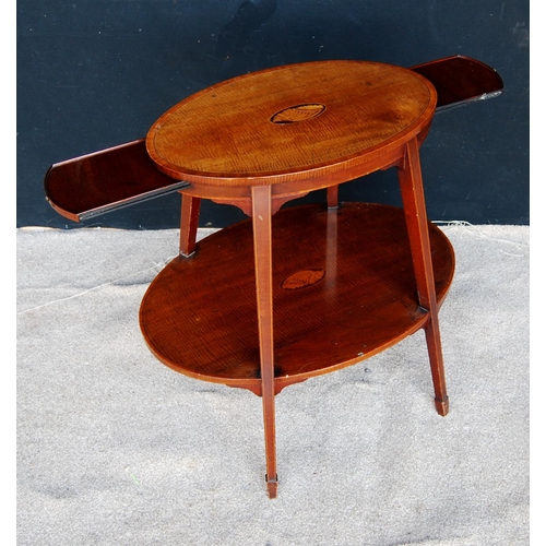 310 - Edwardian kettle stand, the crossbanded oval top with shell inlay over opposing slides, raised on sq... 