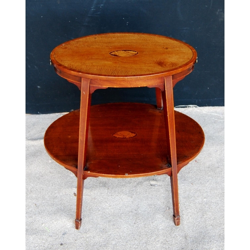 310 - Edwardian kettle stand, the crossbanded oval top with shell inlay over opposing slides, raised on sq... 