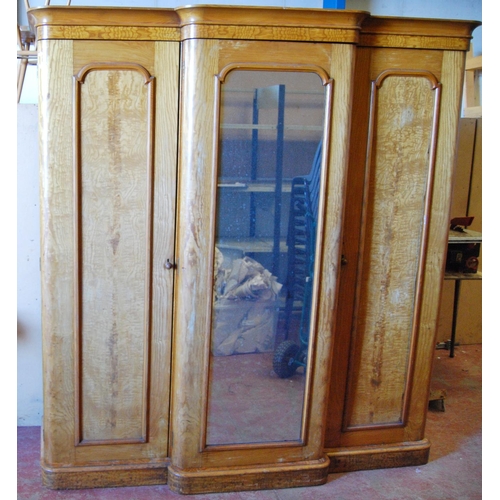 319 - Victorian satinwood breakfront wardrobe, the projected moulded cornice over mirrored door flanked by... 