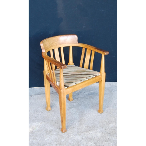 322 - Edwardian oak tub chair with stepped top rail, hoop arms, shaped vertical splats over drop-in pad se... 