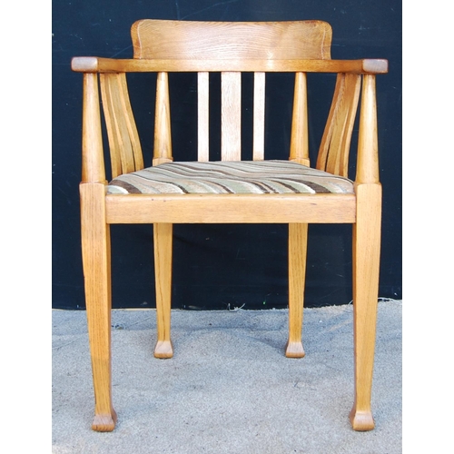 322 - Edwardian oak tub chair with stepped top rail, hoop arms, shaped vertical splats over drop-in pad se... 