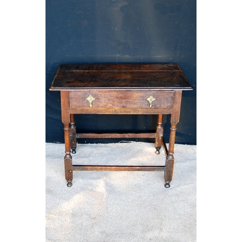 324 - 18th century oak hall table, the moulded rectangular top over frieze drawer with drop handles, raise... 