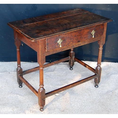 324 - 18th century oak hall table, the moulded rectangular top over frieze drawer with drop handles, raise... 