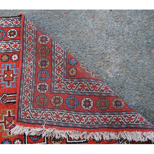 335 - Kurdish Quchan rug with three H panels with arrows over orange ground, all over guls and rosettes, 2... 