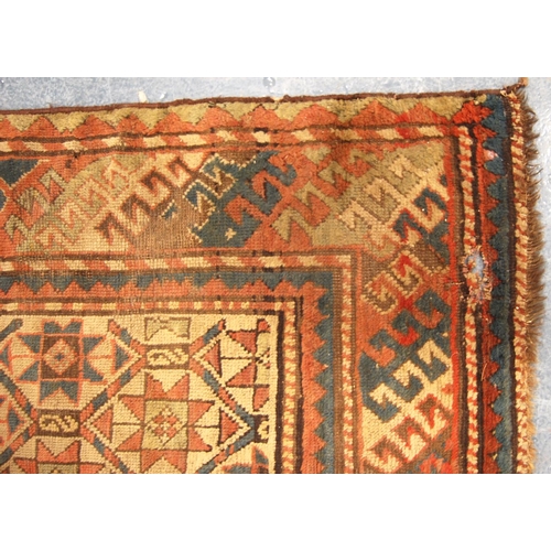 336 - Gendje rug with all over star design, cream ground and triple border, 196cm x 104cm.