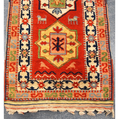 342 - Turkey runner with seven medallions over orange ground and double border, 300cm x 74cm.