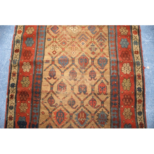 346 - Talish rug, c. 1850, with lattice work field, beige ground and triple border, 203cm x 95cm.