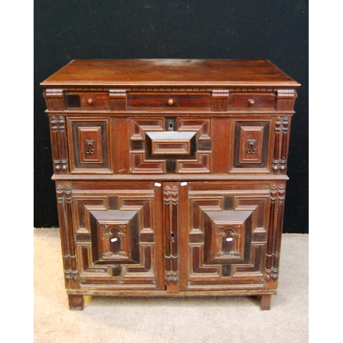 372 - Cavalier's chest, the moulded rectangular top over dentil frieze, frieze drawer, panelled drawers an... 