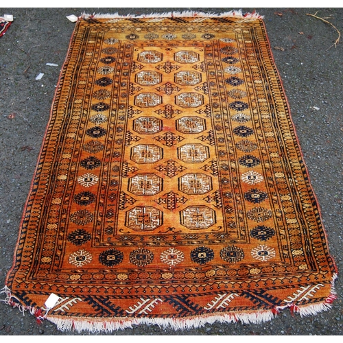 392 - Tekke rug with two rows of seven guls over orange ground, multiple borders, 106cm x 85cm.