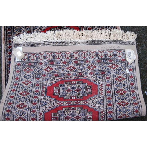 394 - Persian runner with single row of twenty-four guls over beige ground, triple border, 432cm x 81cm.