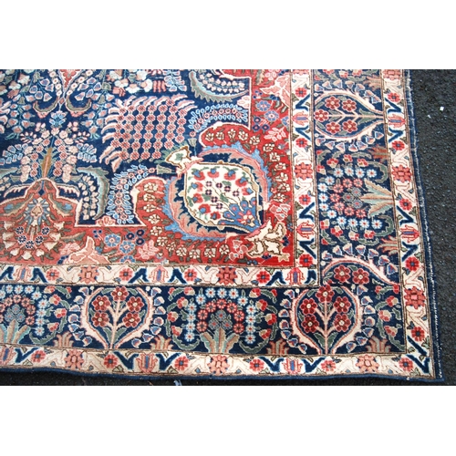 396 - Meshed carpet with central medallion over blue ground, all over floral design, spandrels and triple ... 