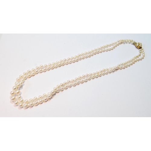 65 - Cultured pearl necklace, two strands, graduated, on pearl and turquoise-set gold snap.