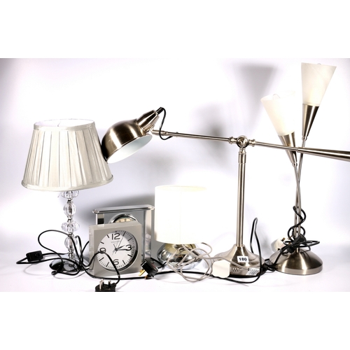 180 - Four table lamps, a Whitehall mantle clock and a Mayfair mantle clock.