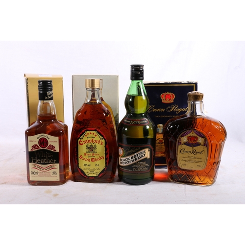 169 - Four bottles of blended whisky including WHITE HEATHER special old deluxe reserve 70cl 40% vol boxed... 