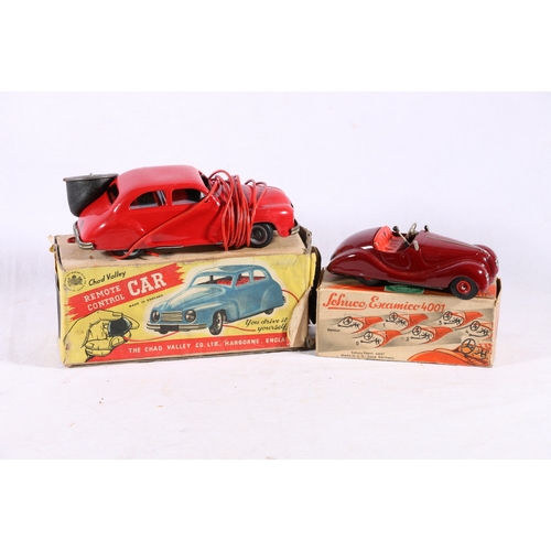 88 - Schuco Examico 4001 clockwork motor car boxed and a Triang Minic clockwork toys scale model and a Ch... 