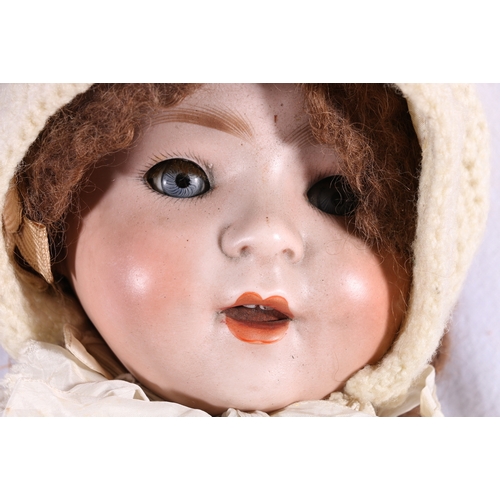 94 - Burggrub of Germany porcelain headed doll, the head marked 