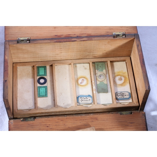 269 - Brass microscope in fitted case, a box of old slides and an Otis King slide rule patent 183723 boxed