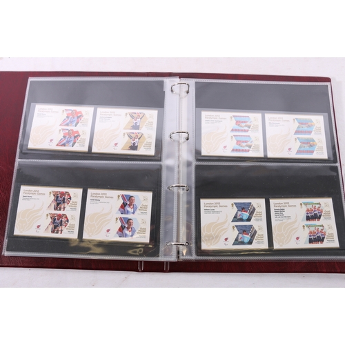 327 - Royal Mail GB, a London 2012 Olympics collection of stamps in one binder including 29 single first c... 