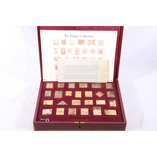 387 - Hallmark Replicas Limited The Empire Collection set of 25 silver stamp ingots, 485g gross in fitted ... 