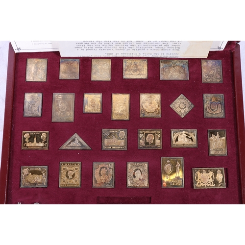 387 - Hallmark Replicas Limited The Empire Collection set of 25 silver stamp ingots, 485g gross in fitted ... 