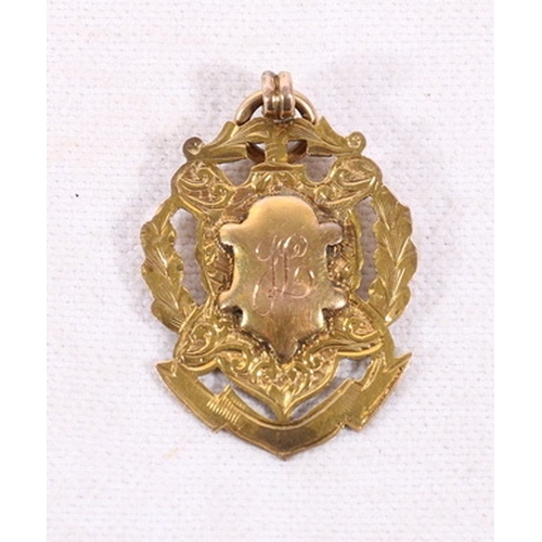 493 - 9ct gold medal fob engraved 