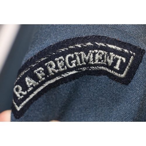 548 - British Royal Air Force dress uniform jacket having brass RAF buttons, cuff braid for the rank of Ai... 