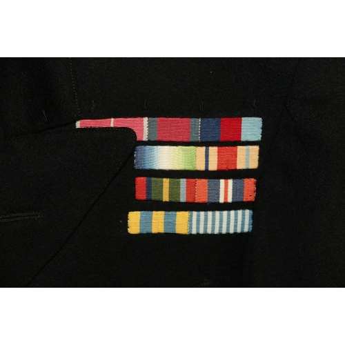 563 - British Royal Navy dress uniform jacket having Gieves label 