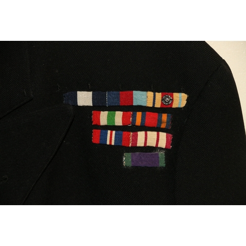 569 - British Royal Navy dress uniform jacket having Gieves label 